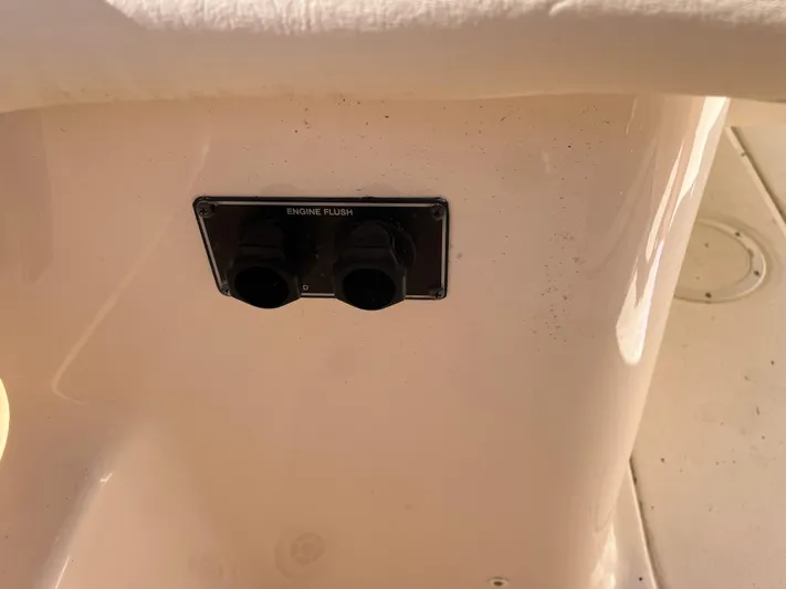  Yacht Photos Pics 2023 Grady-White Freedom 275 engine flush ports on boat deck.