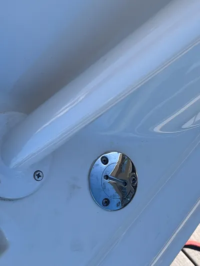  Yacht Photos Pics Close-up of a 2023 Grady-White Freedom 275 boat detail, featuring a metal fitting.