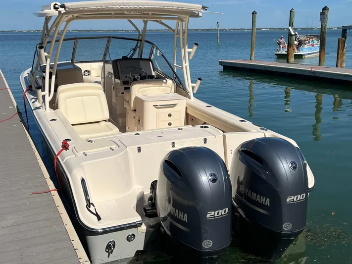  Yacht Photos Pics 2023 Grady-White Freedom 275 boat docked with twin Yamaha 200 engines.