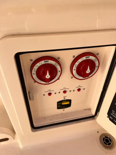  Yacht Photos Pics Control panel of 2023 Grady-White Freedom 275 boat with red switches and indicators.