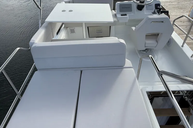  Yacht Photos Pics Flybridge of 2026 Beneteau Antares 11 Fly with seating and helm station.