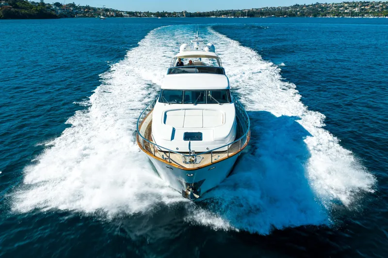 Ilyria Yacht Photos Pics Sanlorenzo SL72 yacht cruising on blue ocean waters, 2007 model.