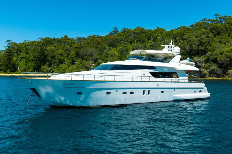Ilyria Yacht Photos Pics Luxurious 2007 Sanlorenzo SL72 yacht cruising on serene blue waters.