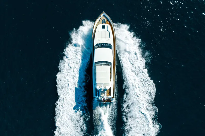 Ilyria Yacht Photos Pics Aerial view of 2007 Sanlorenzo SL72 yacht cruising on open water.