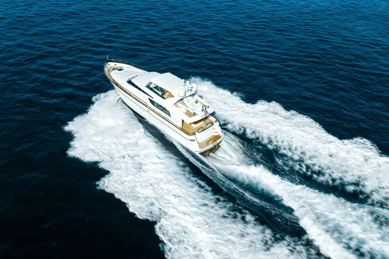 Ilyria Yacht Photos Pics Aerial view of 2007 Sanlorenzo SL72 yacht cruising on open sea.