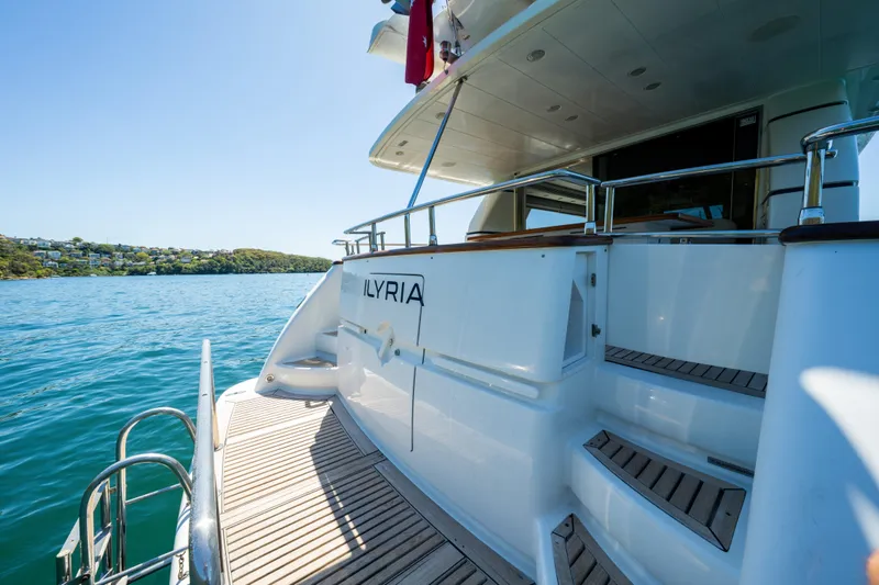 Ilyria Yacht Photos Pics Sanlorenzo SL72 yacht, 2007 model, docked with scenic ocean view.
