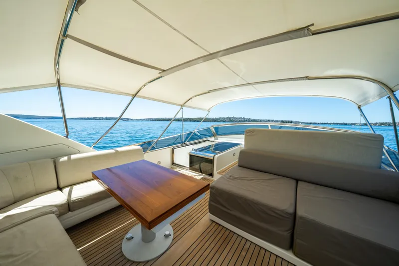 Ilyria Yacht Photos Pics Luxurious 2007 Sanlorenzo SL72 yacht deck with elegant seating and ocean view.