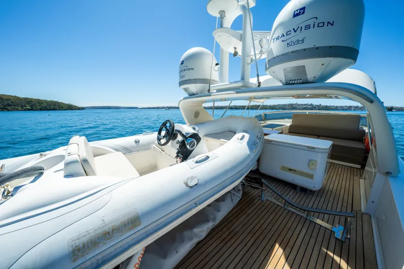 Ilyria Yacht Photos Pics Luxurious 2007 Sanlorenzo SL72 yacht deck with seating and navigation equipment.