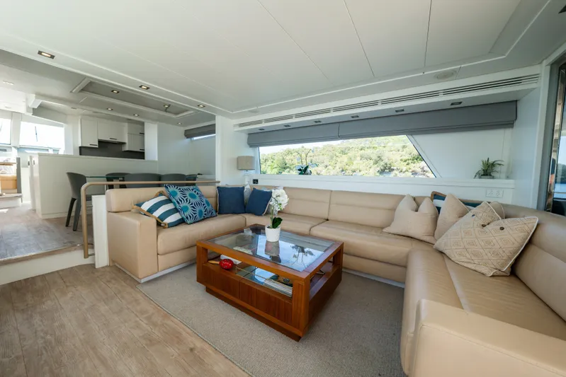 Ilyria Yacht Photos Pics Luxurious interior of 2007 Sanlorenzo SL72 yacht with elegant seating and modern decor.