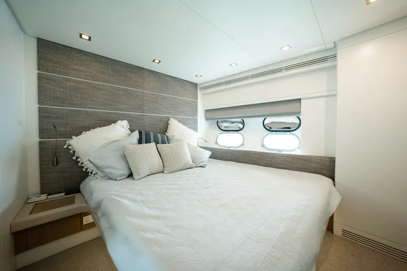 Ilyria Yacht Photos Pics Luxurious bedroom interior of 2007 Sanlorenzo SL72 yacht with modern design.