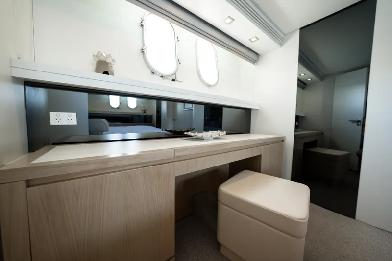 Ilyria Yacht Photos Pics Luxurious interior of 2007 Sanlorenzo SL72 yacht with elegant vanity and seating.