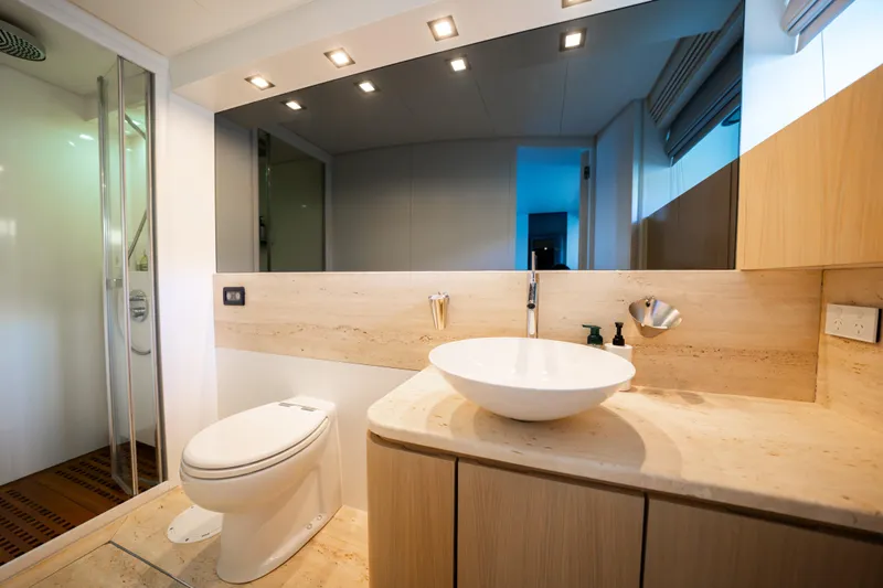 Ilyria Yacht Photos Pics Luxurious bathroom on 2007 Sanlorenzo SL72 yacht with modern fixtures and elegant design.