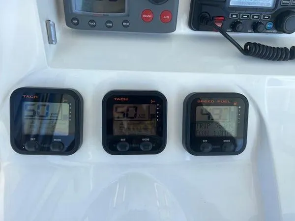  Yacht Photos Pics Boat dashboard with tachometers and speed fuel gauge, Spectre 34, 2008 model.