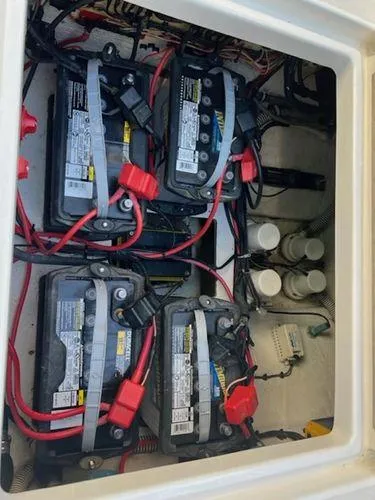  Yacht Photos Pics Battery compartment of a 2008 Spectre 34 boat with multiple batteries and wiring.