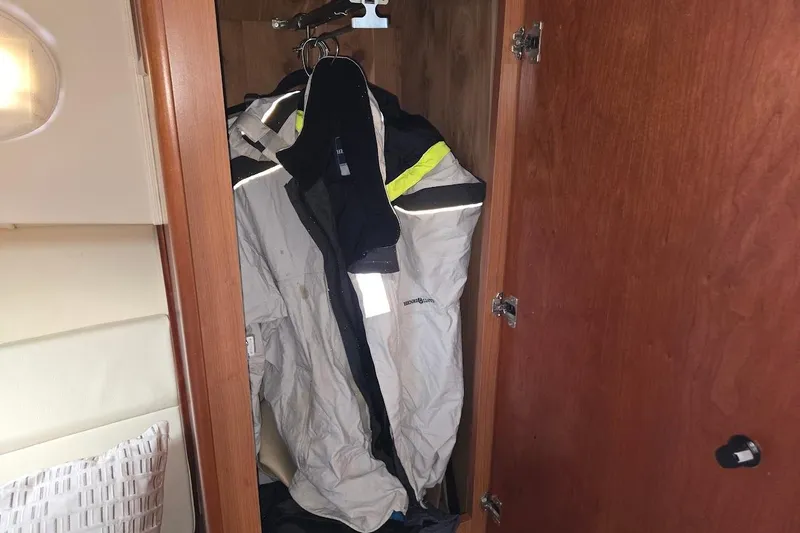 Bay'be Yacht Photos Pics Closet with jackets inside a 2009 Mainship Pilot 31 boat.