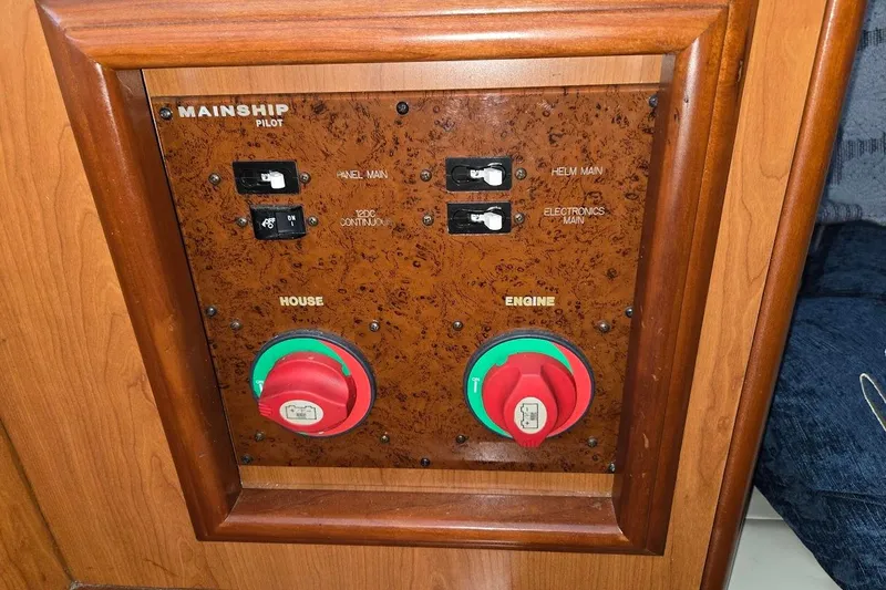 Bay'be Yacht Photos Pics Control panel of a 2009 Mainship Pilot 31 boat with switches and dials.