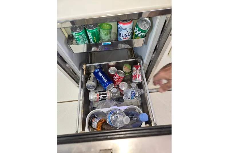 Bay'be Yacht Photos Pics Refrigerator stocked with drinks on a 2009 Mainship Pilot 31 boat.