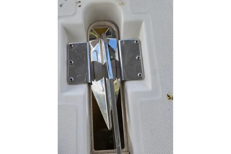 Bay'be Yacht Photos Pics Anchor holder on 2009 Mainship Pilot 31 boat, featuring stainless steel fittings.
