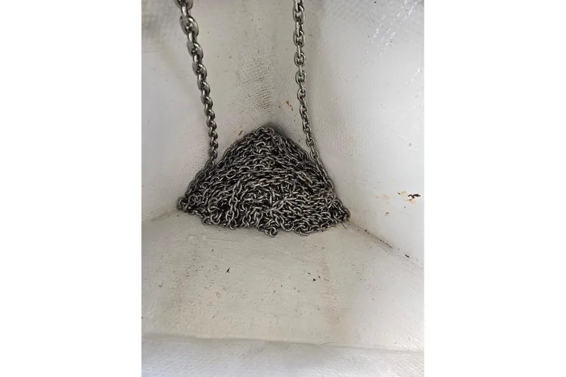 Bay'be Yacht Photos Pics Anchor chain in a 2009 Mainship Pilot 31 boat compartment.