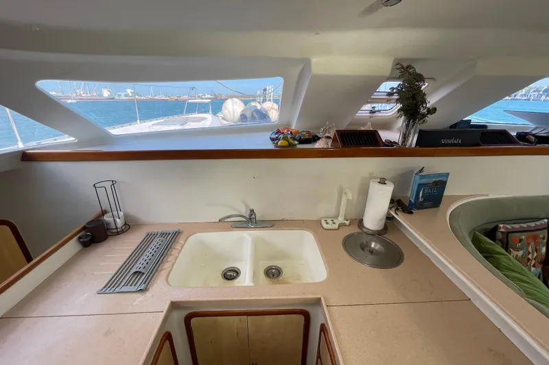 Nadi Yacht Photos Pics Interior of 2010 Knysna 480 yacht with kitchen sink and sea view.