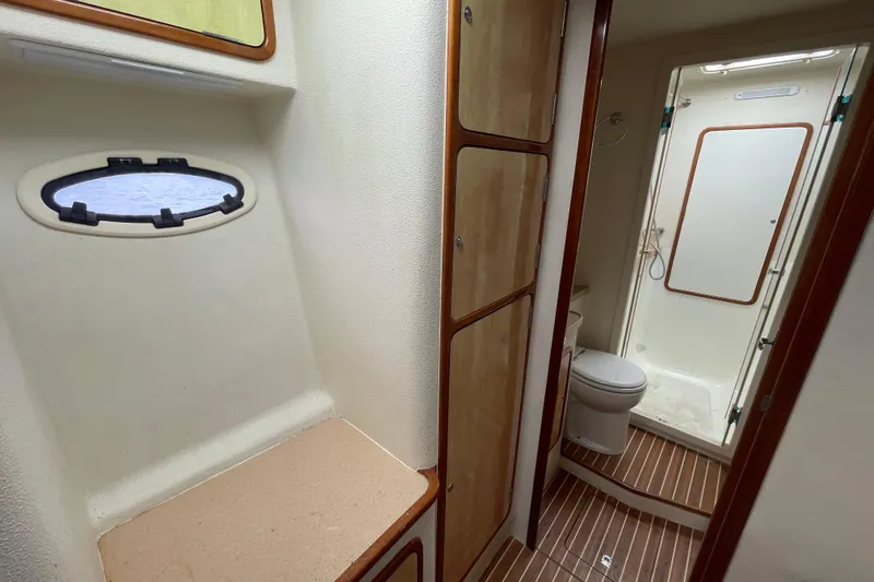 Nadi Yacht Photos Pics Interior of 2010 Knysna 480 yacht showing bathroom and storage area.