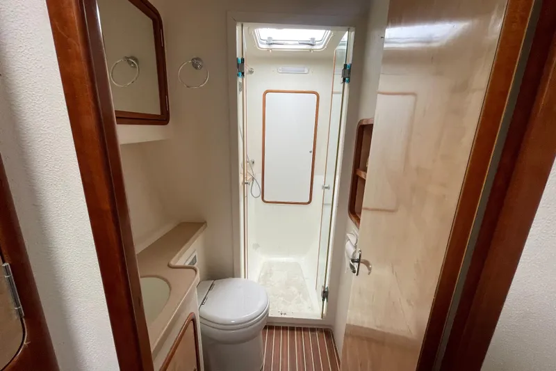 Nadi Yacht Photos Pics Bathroom interior of 2010 Knysna 480 yacht with shower and toilet.