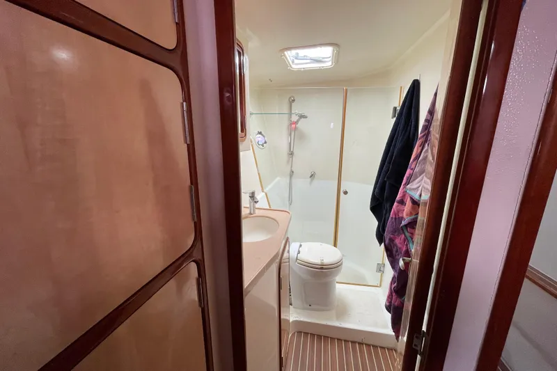 Nadi Yacht Photos Pics Bathroom interior of 2010 Knysna 480 yacht with shower and toilet.