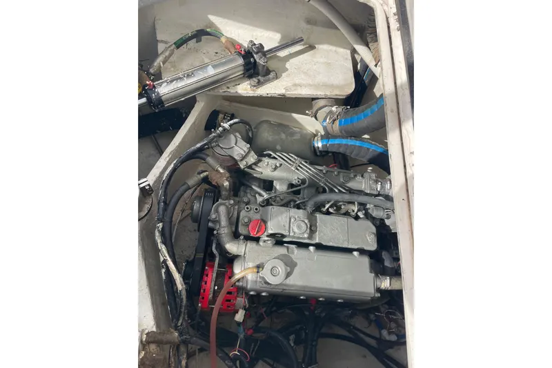 Nadi Yacht Photos Pics Engine compartment of a 2010 Knysna 480 boat, showing mechanical components and hoses.