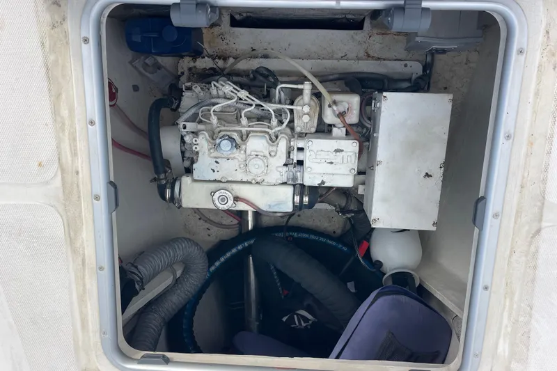 Nadi Yacht Photos Pics Engine compartment of a 2010 Knysna 480 boat, showing mechanical components and hoses.