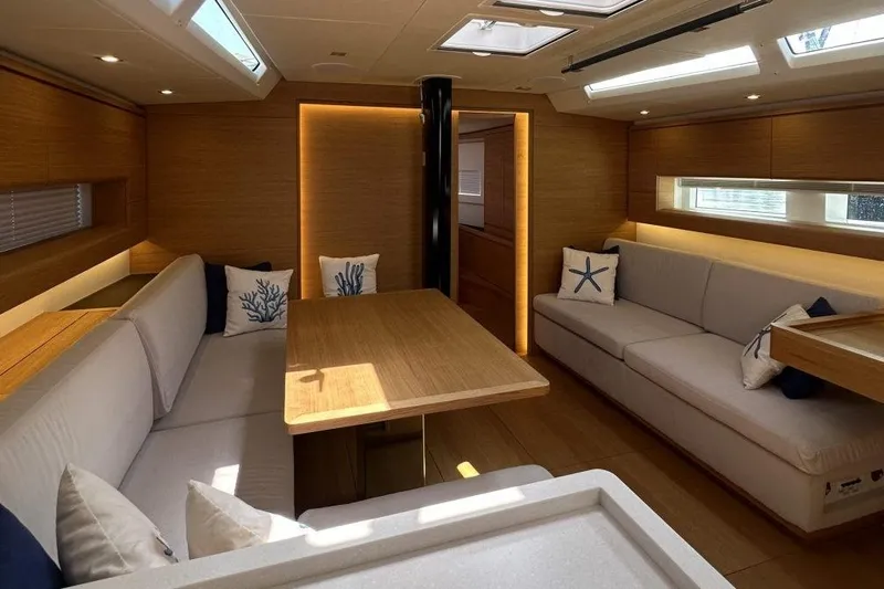 Luna Rossa Yacht Photos Pics Luxurious interior of 2023 Solaris 50 yacht with elegant seating and modern design.