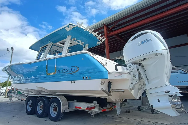 360-105 Yacht Photos Pics 2026 Robalo R360 Center Console boat with Yamaha engine on trailer.