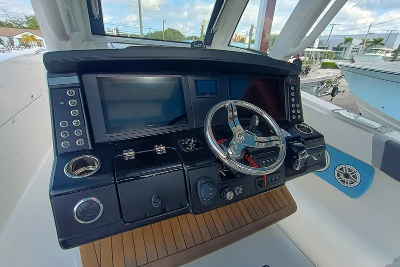 360-105 Yacht Photos Pics 2026 Robalo R360 Center Console helm with modern controls and navigation display.