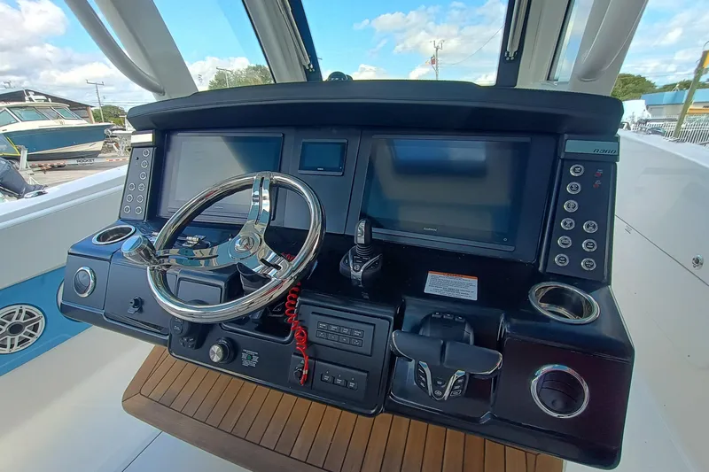 360-105 Yacht Photos Pics 2026 Robalo R360 Center Console helm with advanced controls and navigation displays.
