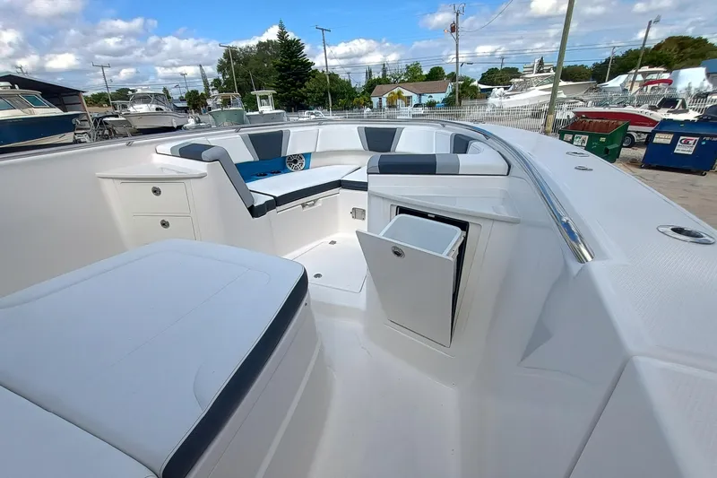 360-105 Yacht Photos Pics 2026 Robalo R360 Center Console boat interior with seating and storage compartments.