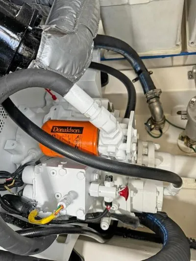  Yacht Photos Pics Engine compartment of a 2012 Riviera Convertible with visible Donaldson filter.