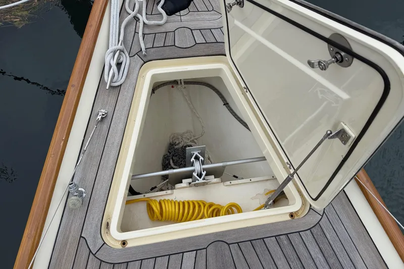 Sea Suite Yacht Photos Pics Open hatch on 2015 Hinckley DS 42 boat deck, revealing storage compartment.