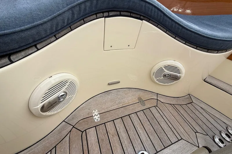 Sea Suite Yacht Photos Pics Hinckley DS 42 (2015) boat interior with speakers and wooden flooring.