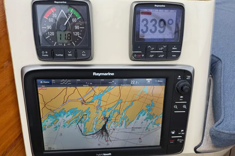 Sea Suite Yacht Photos Pics Hinckley DS 42 yacht navigation system with Raymarine displays showing map and compass.
