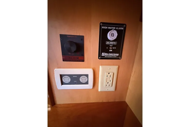 Sea Suite Yacht Photos Pics Control panel and high water alarm on 2015 Hinckley DS 42 yacht interior.