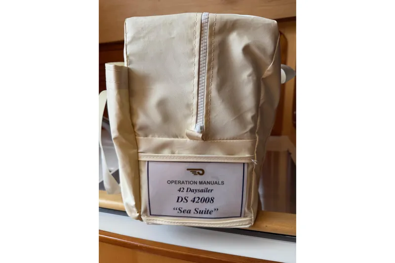 Sea Suite Yacht Photos Pics Operation manuals bag for 2015 Hinckley DS 42 Daysailer, labeled "Sea Suite."