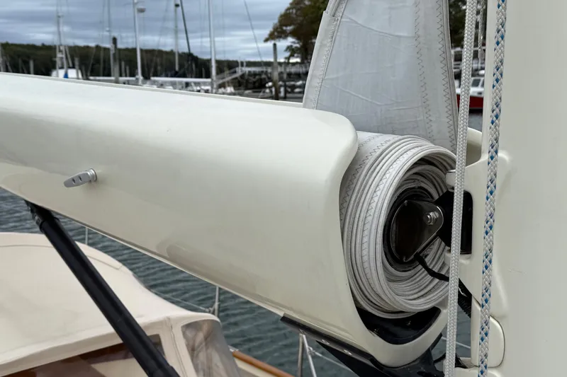 Sea Suite Yacht Photos Pics Close-up of a 2015 Hinckley DS 42 sailboat's furling system with rolled sail.