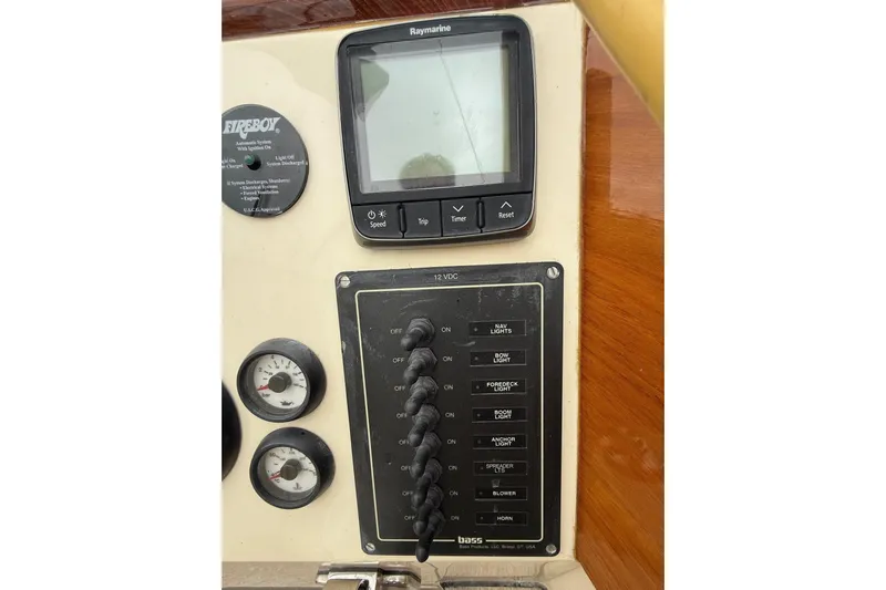 Sea Suite Yacht Photos Pics Control panel of a 2015 Hinckley DS 42 boat with gauges and switches.