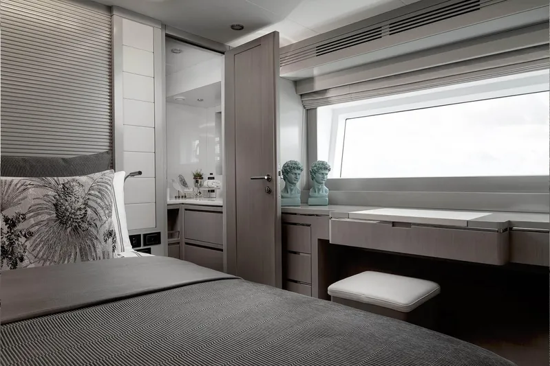  Yacht Photos Pics Luxurious interior of 2024 Sirena 68 yacht with modern bedroom and elegant decor.