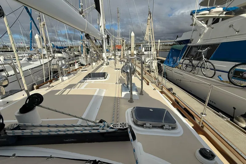 Sarah Yacht Photos Pics Cabo Rico Cutter 45 sailboat deck, 2000 model, docked with clear skies.