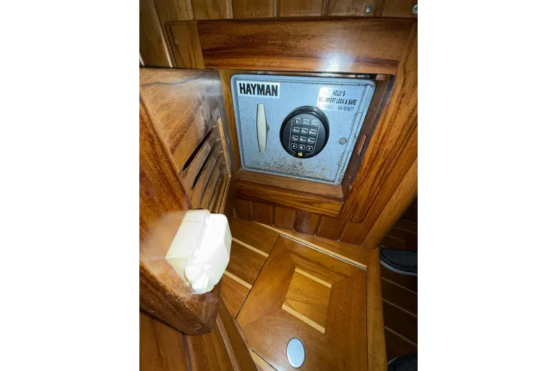 Sarah Yacht Photos Pics Secure safe inside 2000 Cabo Rico Cutter 45 yacht, featuring keypad lock.
