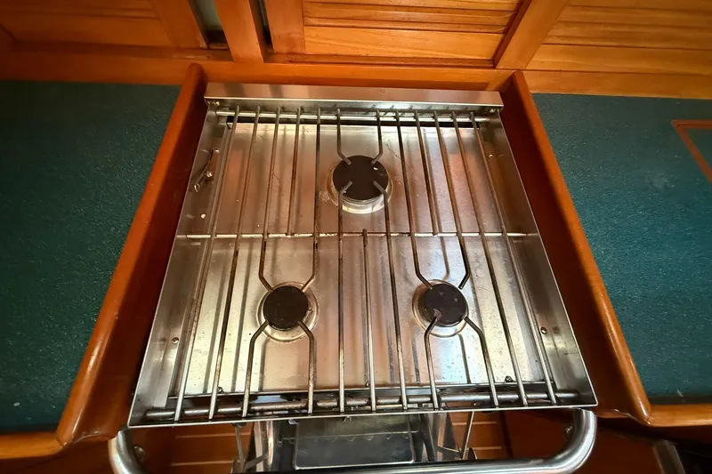 Sarah Yacht Photos Pics Stainless steel stove in 2000 Cabo Rico Cutter 45 yacht kitchen.