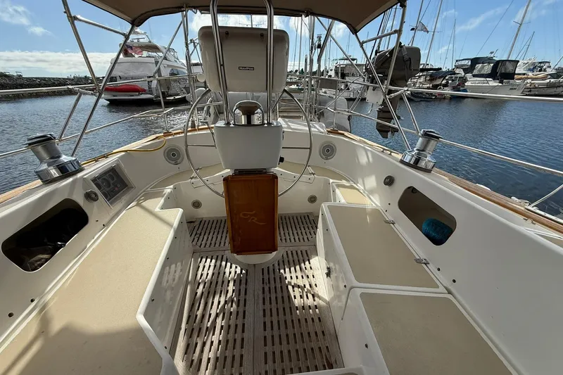 Sarah Yacht Photos Pics Cabo Rico Cutter 45 sailboat cockpit, 2000 model, docked in a marina.