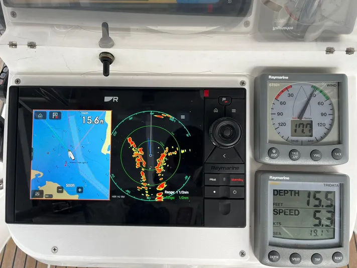 Yacht Photos Pics Navigation instruments on a 2007 Beneteau 423 yacht, displaying radar, depth, and speed data.