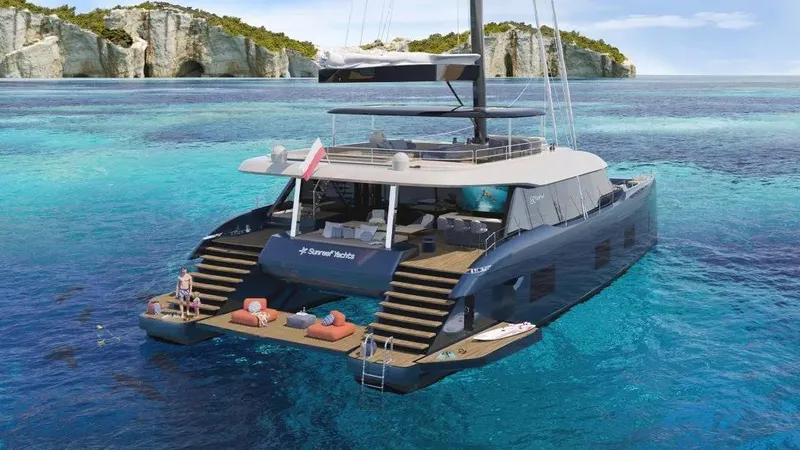  Yacht Photos Pics Luxurious 2026 Sunreef 100 yacht on turquoise waters near rocky coastline.