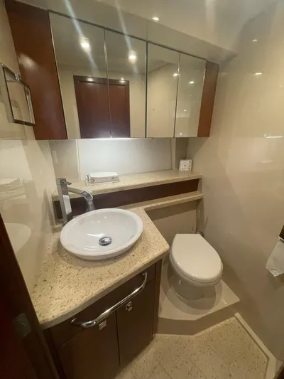 Seaquell Yacht Photos Pics Luxurious bathroom in 2012 Cruisers Yachts 48 Cantius with modern fixtures and elegant design.
